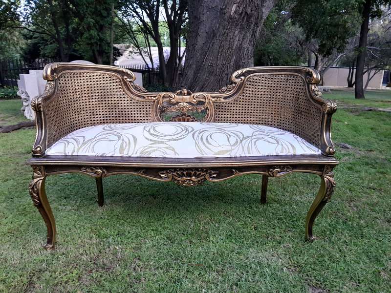 A 20TH Century French Louis XVI Style Giltwood Rattan Settee and Two Matching Bergere Chairs Upho...