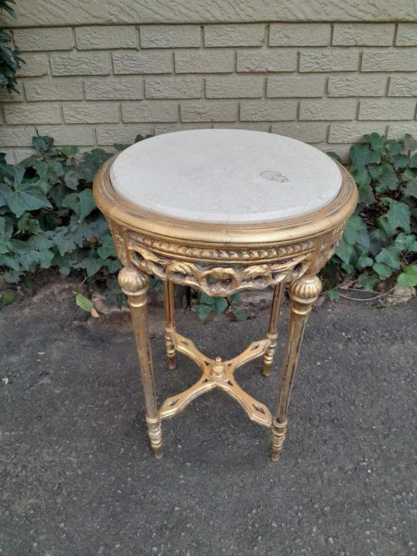 A 20th Century French Style Carved and Hand Gilded Side Table with Marble Top