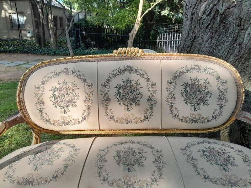 A 20th Century French Louis XVI Style Set of a Carved and Gilded Settee and Four Armchairs with T...