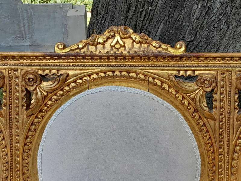 A 20th Century French Style Ornately Carved Gilt Wood Set Comprising a Settee and Pair of Armchairs