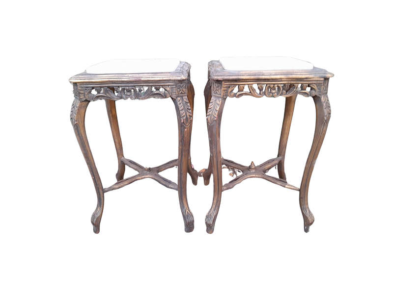 A 20TH Century French Style Pair Of Carved And Gilded Side Tables With Marble Tops