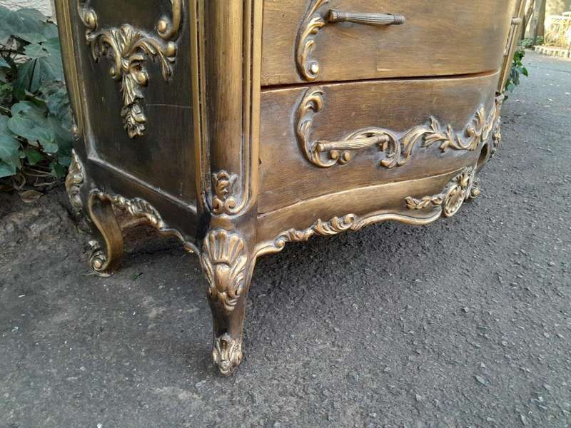 A French Style Ornate and Gilded Chest of Drawers with Marble Top