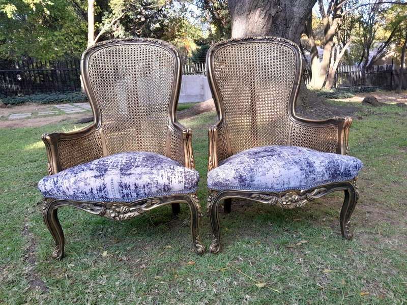 A 20th Century Pair of French Style Gilt Wood Rattan Arm Chairs