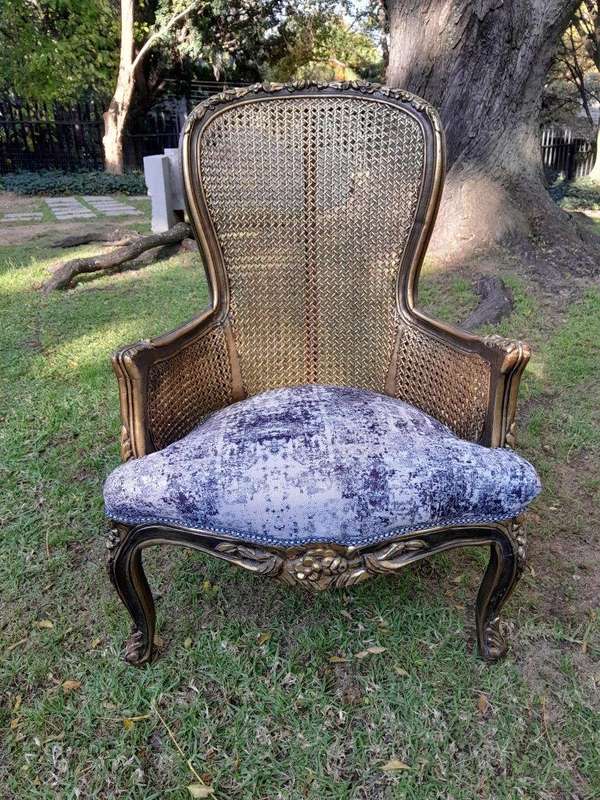 A 20th Century Pair of French Style Gilt Wood Rattan Arm Chairs