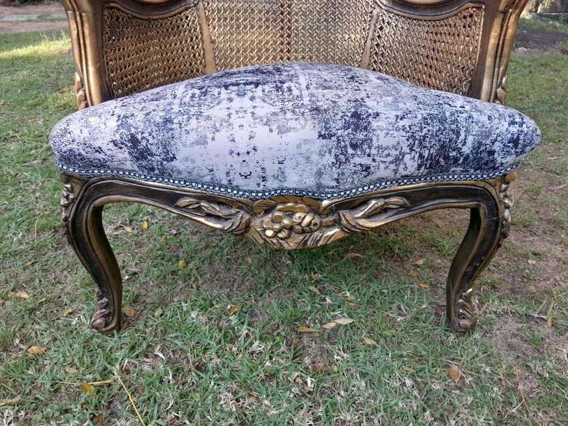 A 20th Century Pair of French Style Gilt Wood Rattan Arm Chairs