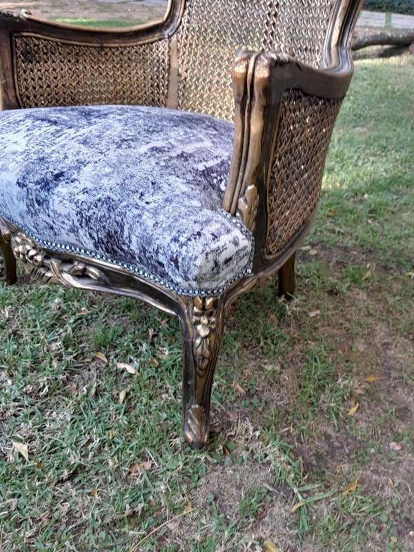 A 20th Century Pair of French Style Gilt Wood Rattan Arm Chairs
