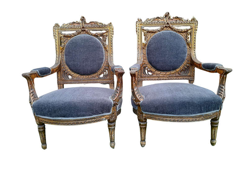 A Pair Of 20th Century French Style Ornately Carved Gilt Wood Arm Chairs