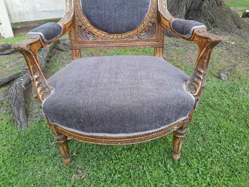 A Pair Of 20th Century French Style Ornately Carved Gilt Wood Arm Chairs
