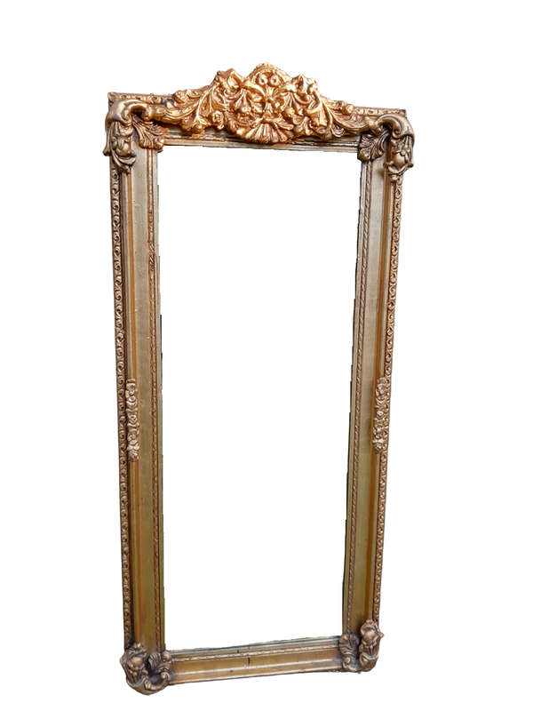 A French Style Ornately Carved and Gilded Bevelled Mirror