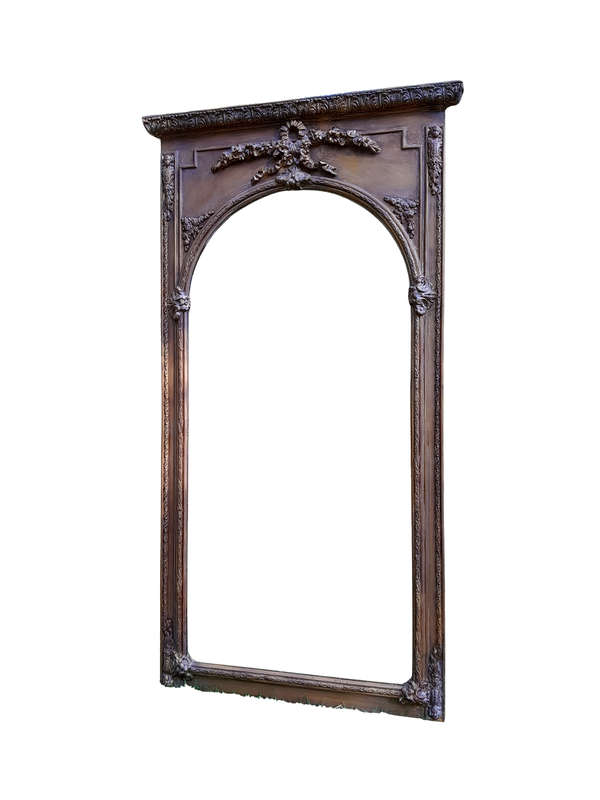 A French Style Ornately Carved and Gilded Bevelled Mirror of Large Proportions