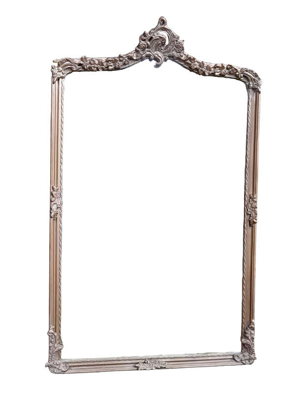 A French Style Ornately Carved and Gilded Bevelled Mirror of Large Proportions