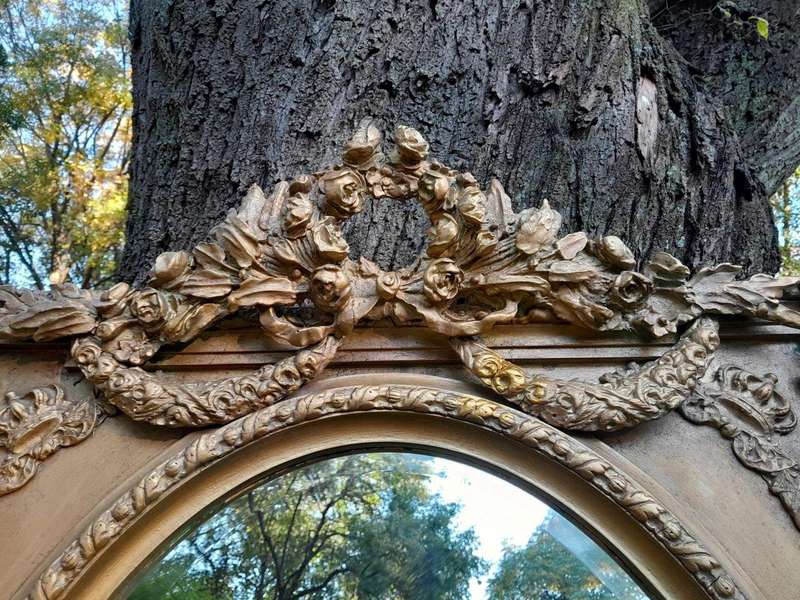 A French Rococo Style Ornately Carved & Gilded Bevelled Mirror