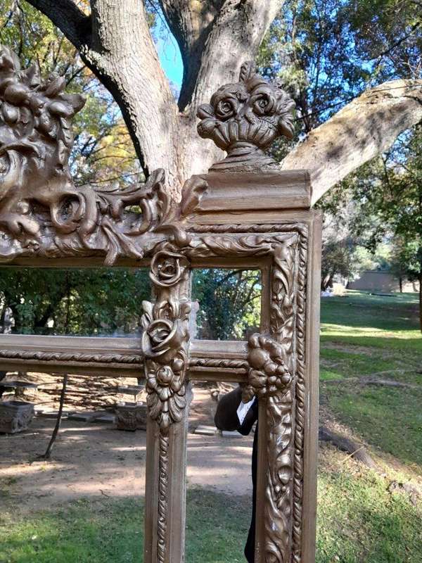 A French Rococo Style Large Ornately Carved & Gilded Bevelled Mirror