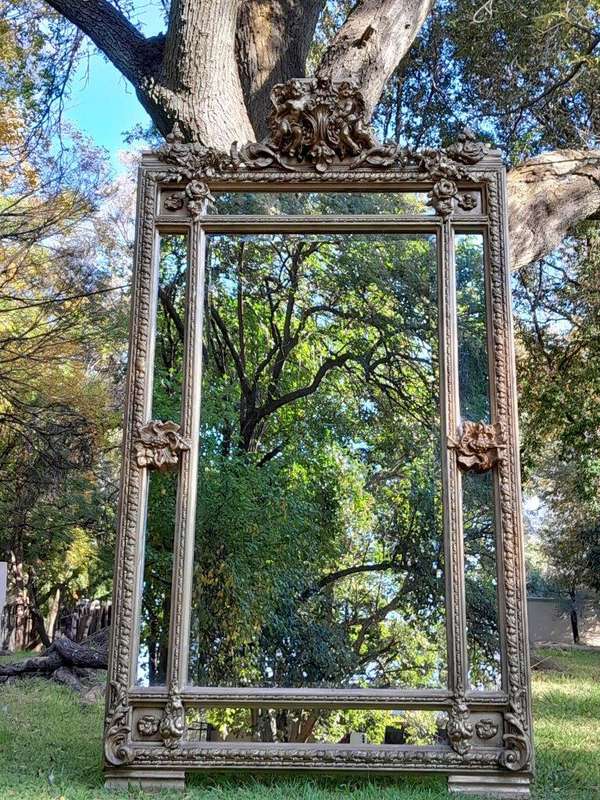 A French Rococo Style Ornately Carved & Gilded Large Bevelled Mirror