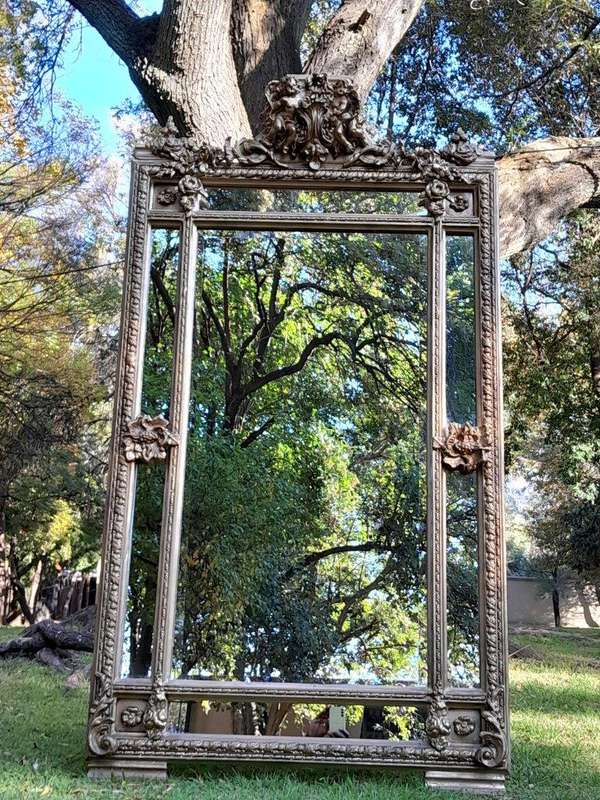 A French Rococo Style Ornately Carved & Gilded Large Bevelled Mirror