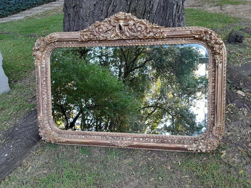 A French Rococo Style Ornately Carved & Gilded Bevelled Mirror