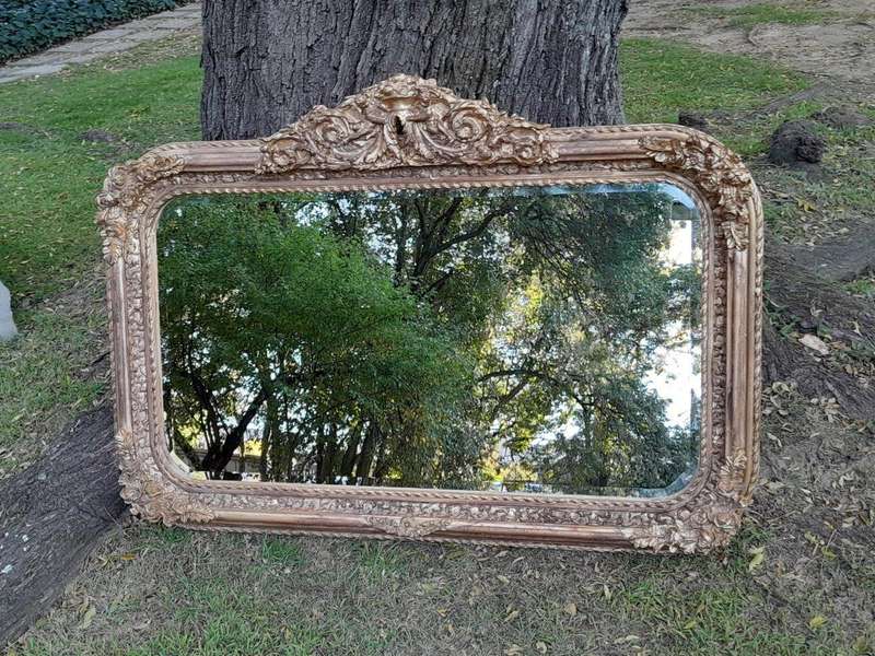 A French Rococo Style Ornately Carved & Gilded Bevelled Mirror