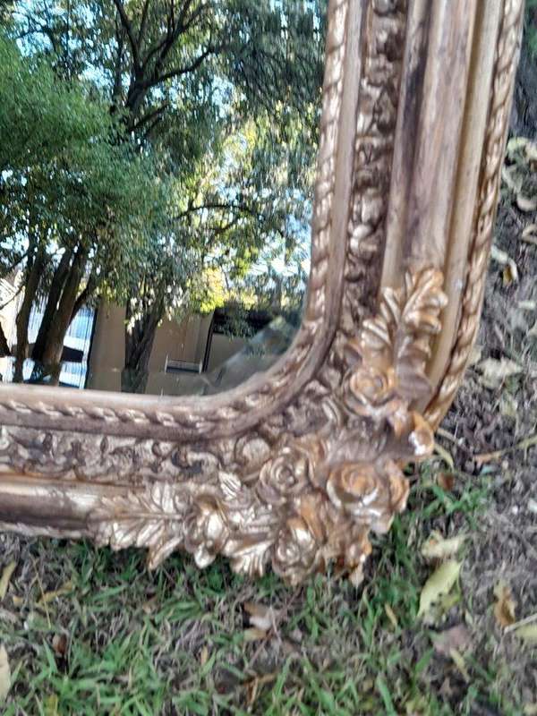 A French Rococo Style Ornately Carved & Gilded Bevelled Mirror