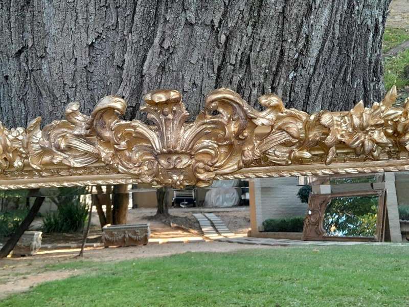 A French Rococo Style Ornately Carved & Gilded Bevelled Mirror