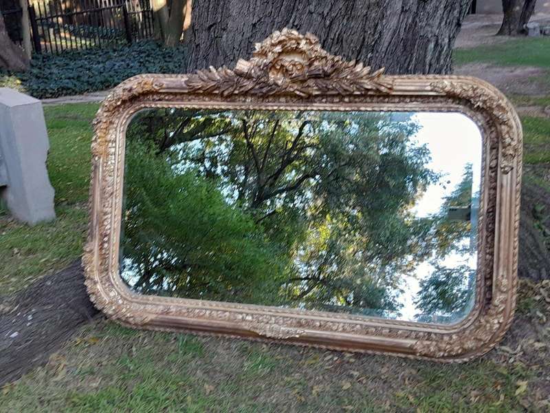 A French Rococo Style Ornately Carved & Gilded Bevelled Mirror