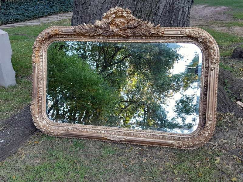 A French Rococo Style Ornately Carved & Gilded Bevelled Mirror