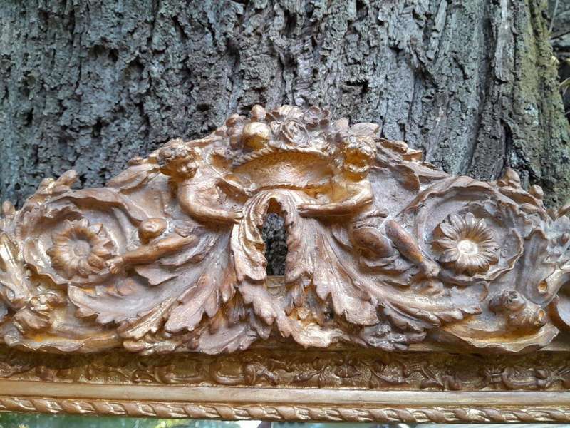 A French Rococo Style Ornately Carved & Gilded Bevelled Mirror