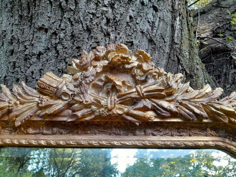 A French Rococo Style Ornately Carved & Gilded Bevelled Mirror