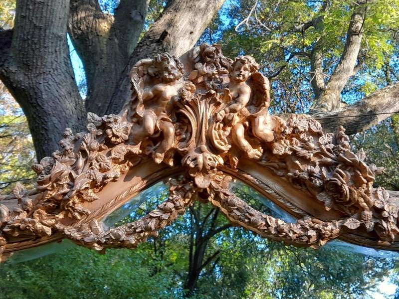 A French Rococo Style Ornately Carved & Gilded Bevelled Mirror