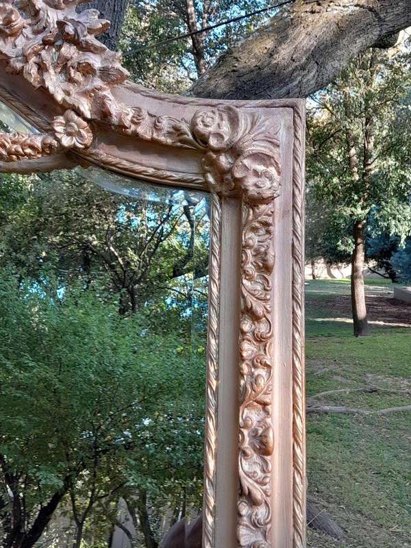 A French Rococo Style Ornately Carved & Gilded Bevelled Mirror