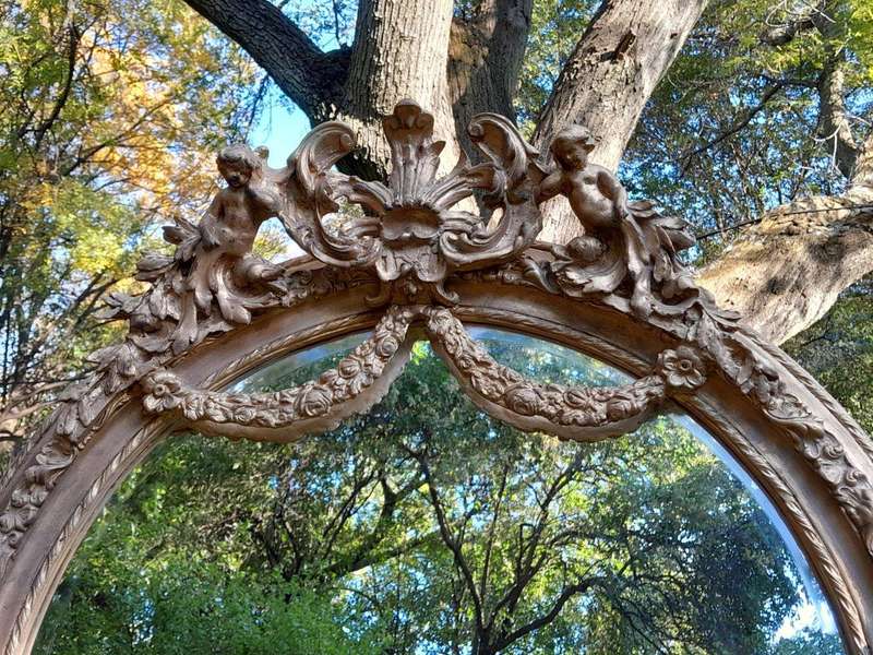A French Rococo Style Ornately Carved & Gilded Bevelled Mirror
