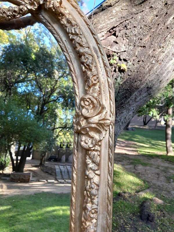A French Rococo Style Ornately Carved & Gilded Bevelled Mirror