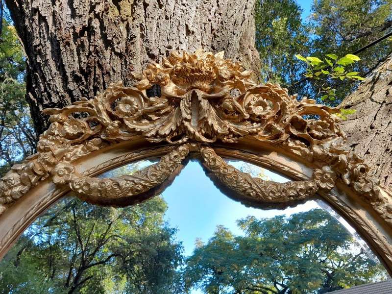 A French Rococo Style Ornately Carved & Gilded Bevelled Mirror