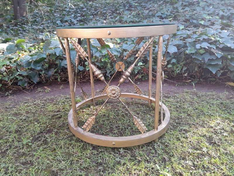 A Custom-made Gilt Metal Circulate Table with Bevelled Mirror