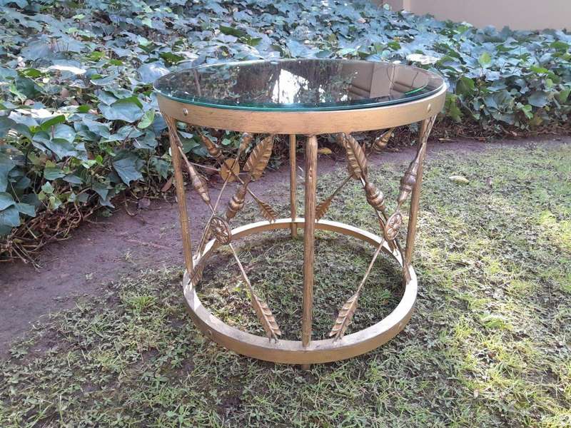 A Custom-made Gilt Metal Circulate Table with Bevelled Mirror