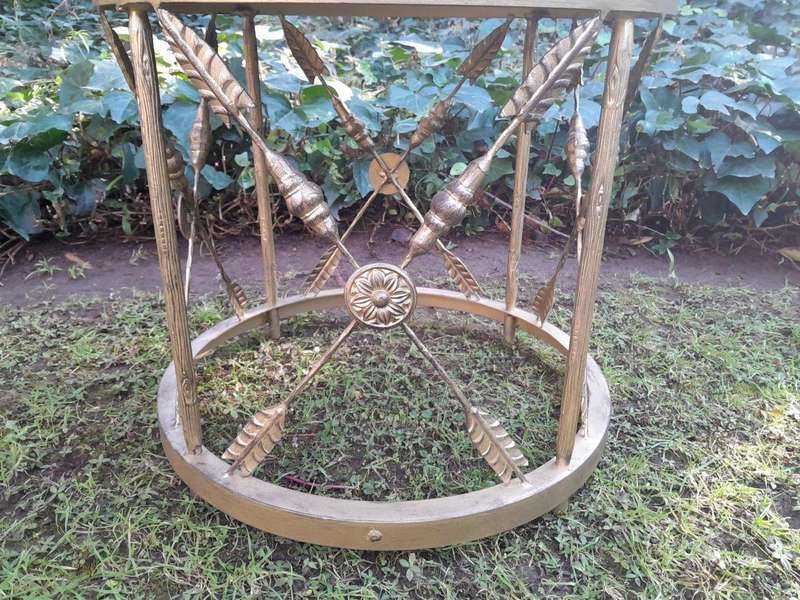 A Custom-made Gilt Metal Circulate Table with Bevelled Mirror
