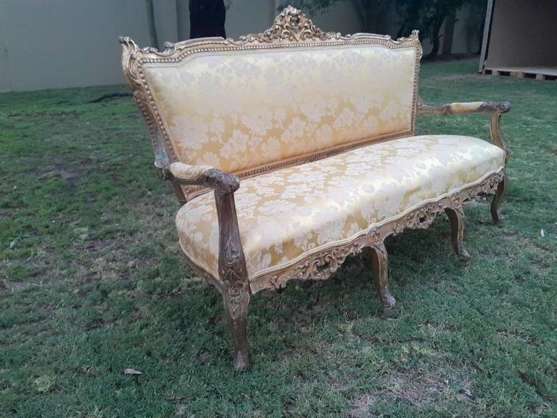 A 20th Century Circa 1950 French Style Ornately Carved Giltwood Settee