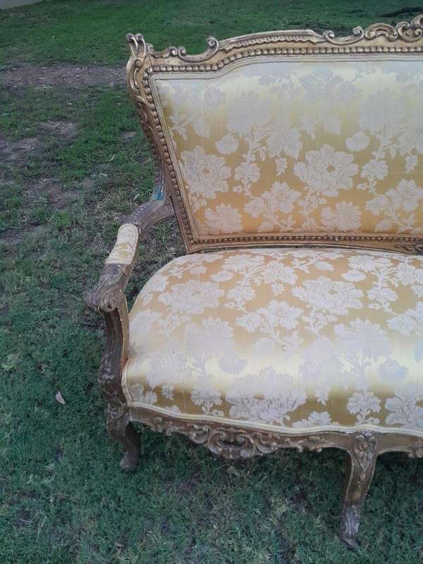 A 20th Century Circa 1950 French Style Ornately Carved Giltwood Settee