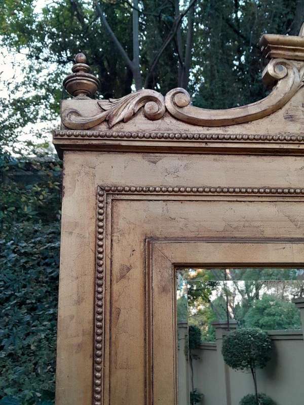 A Massive 20th Century French Style Ornately Carved and Gilded Bevelled Mirror