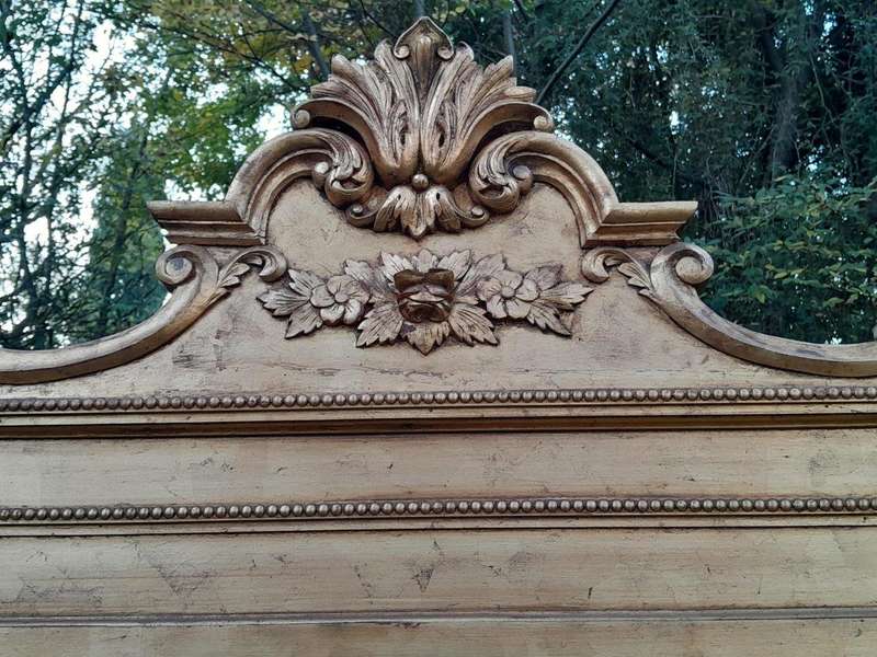 A Massive 20th Century French Style Ornately Carved and Gilded Bevelled Mirror