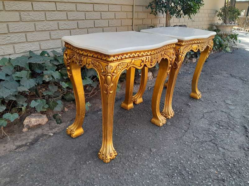 A Pair of 20th century French Style Giltwood Side Tables with Cream Galala Marble Tops