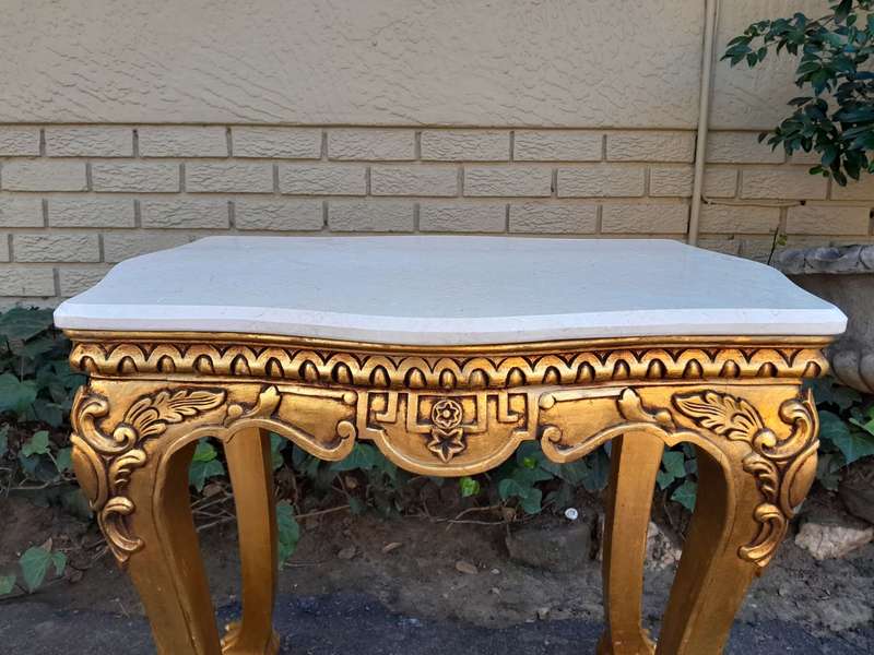 A Pair of 20th century French Style Giltwood Side Tables with Cream Galala Marble Tops