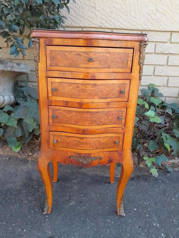 A 20th Century Circa 1920 Pair of French Walnut and Inlaid Bowfront Pedestals with Gilt Metal M...