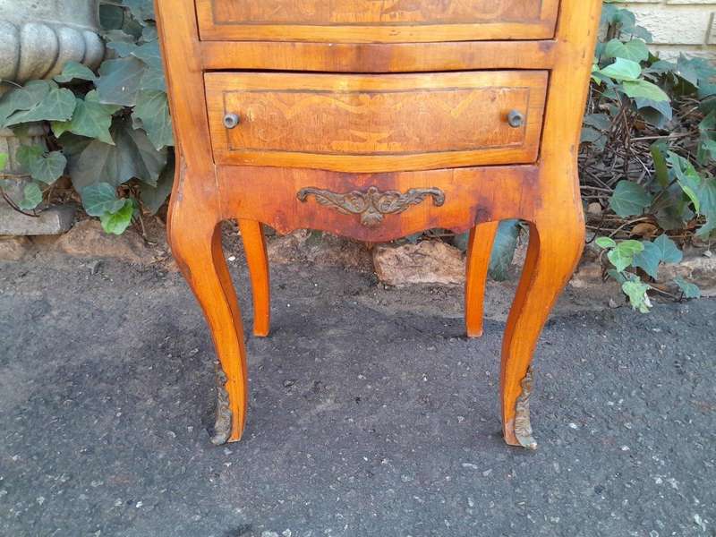 A 20th Century Circa 1920 Pair of French Walnut and Inlaid Bowfront Pedestals with Gilt Metal M...