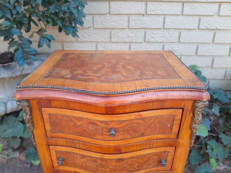 A 20th Century Circa 1920 Pair of French Walnut and Inlaid Bowfront Pedestals with Gilt Metal M...