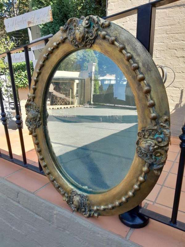 A 20TH Century Gilt Oval Mirror With Convex Mirror
