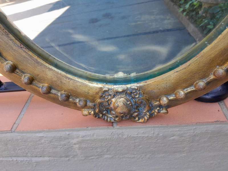 A 20TH Century Gilt Oval Mirror With Convex Mirror