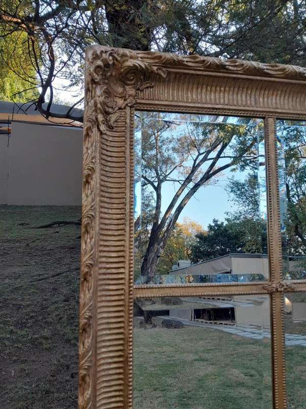A French Style Heavily Carved and Gilded Framed Mirror with Bevelled Mirror Panes of Large Propor...