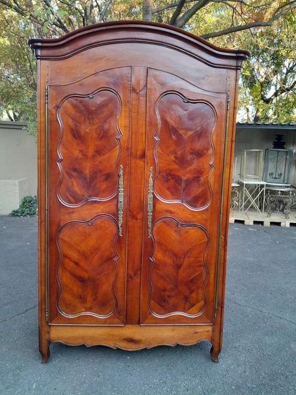 An Early 19th Century French Walnut and Cherrywood Port Armoire with Original Brass Fittings