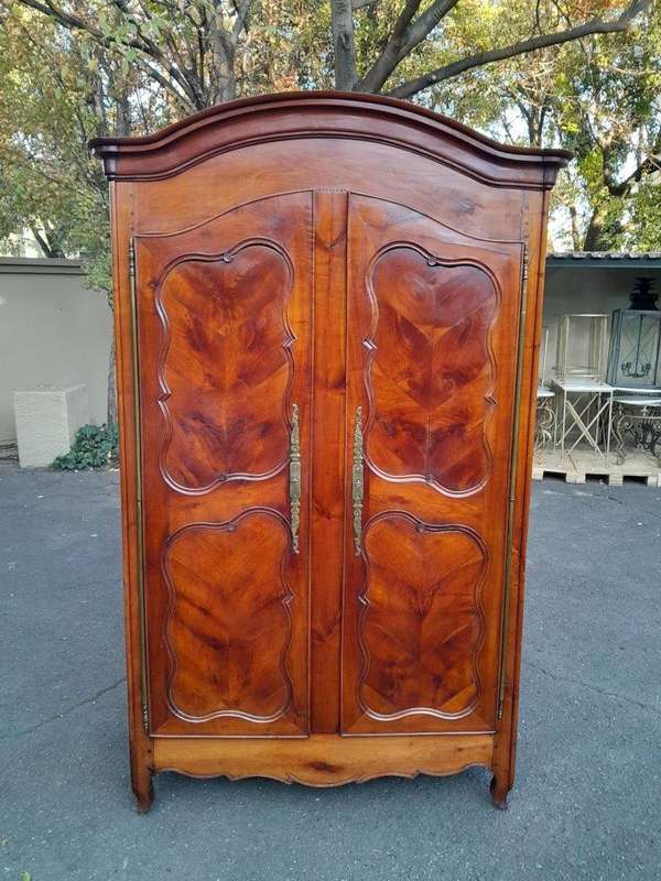 An Early 19th Century French Walnut and Cherrywood Port Armoire with Original Brass Fittings