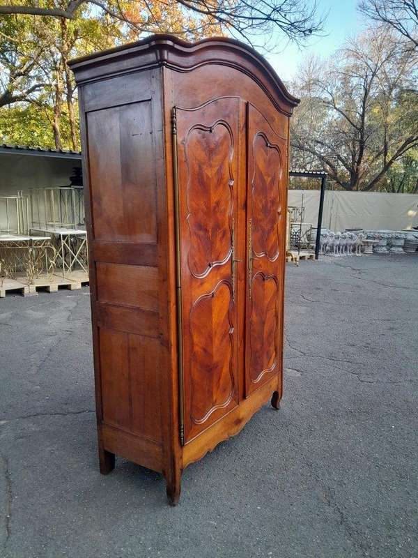 An Early 19th Century French Walnut and Cherrywood Port Armoire with Original Brass Fittings
